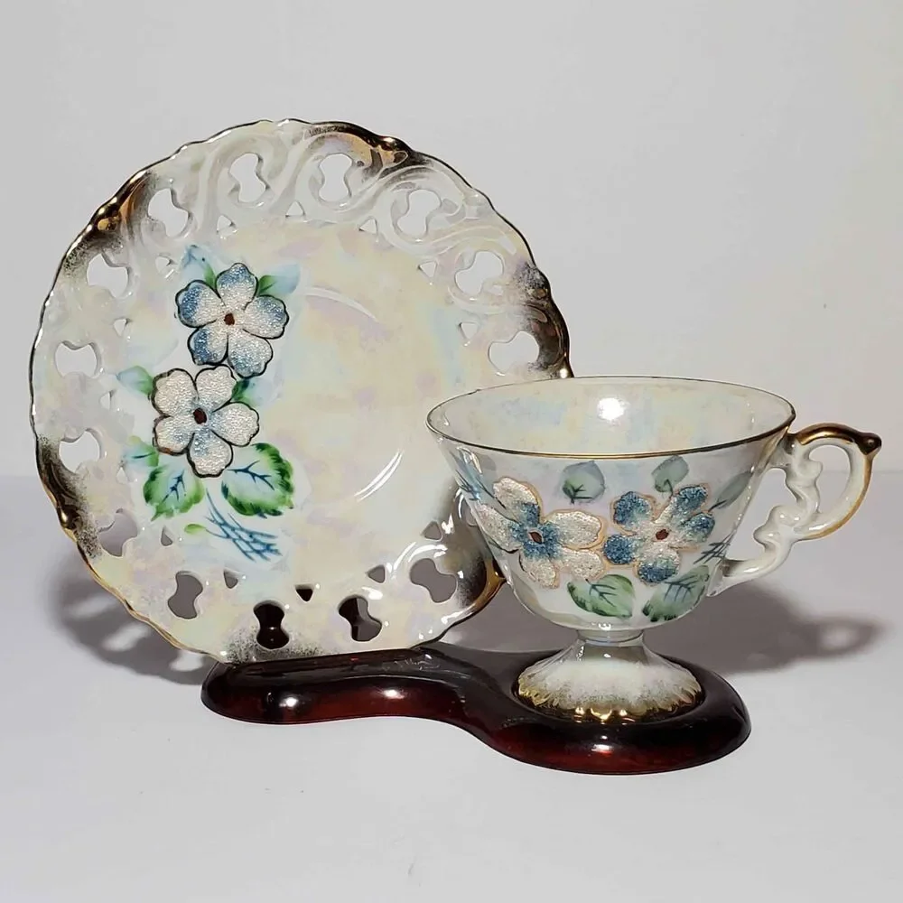 EFCCO Teacup and Saucer Blue White Textured Flowers Reticulated Opalescent